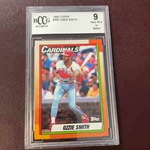 Ozzie Smith Baseball Card.  Graded. Near mint.  1990 Topps.